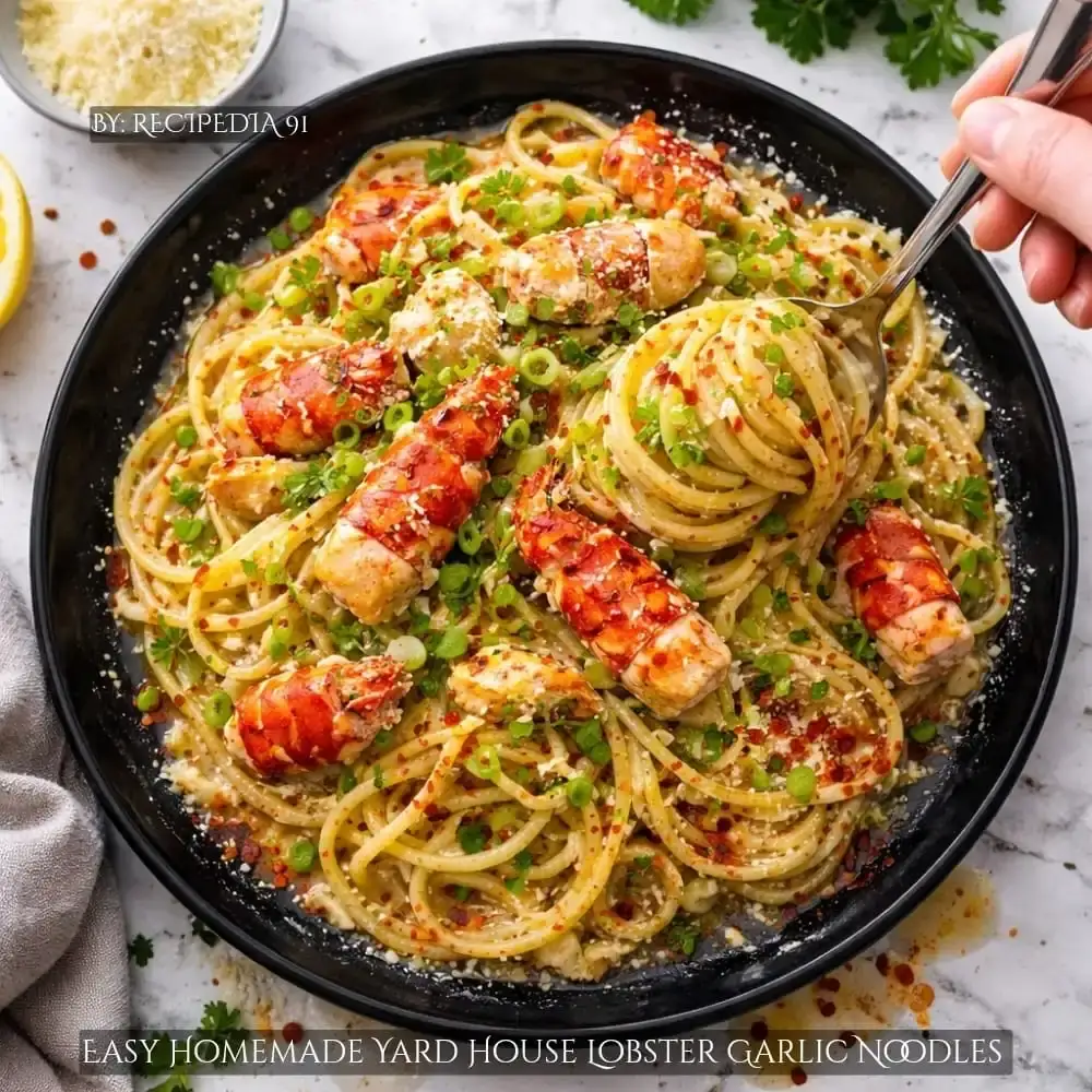 Homemade Yard house Lobster Garlic Noodles - A perfectly made dish on my kitchen table, zoomed overhead image.